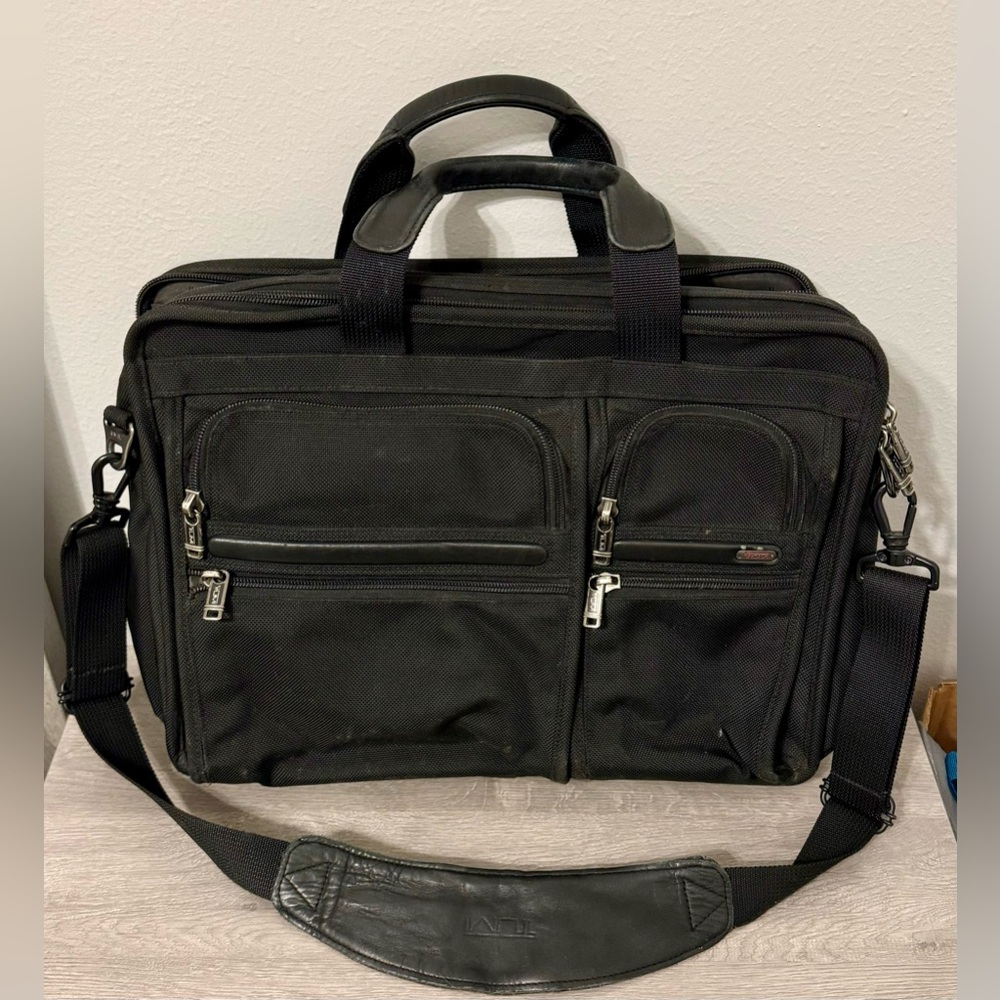 TUMI black laptop carrier bag. It has wallet inside.  It has various - Picture 3 of 15
